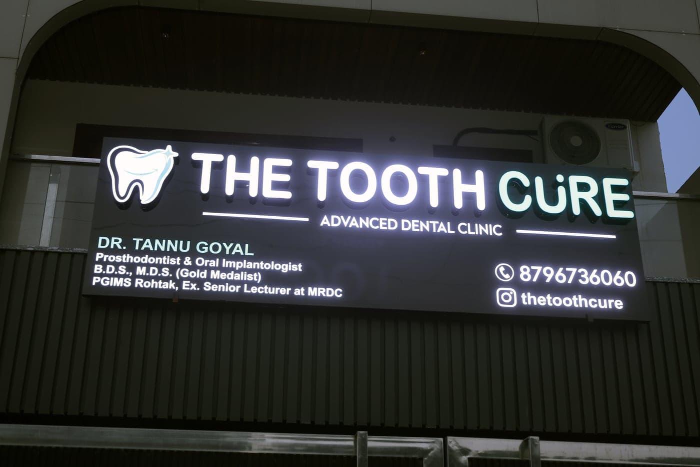 The Tooth Cure signage